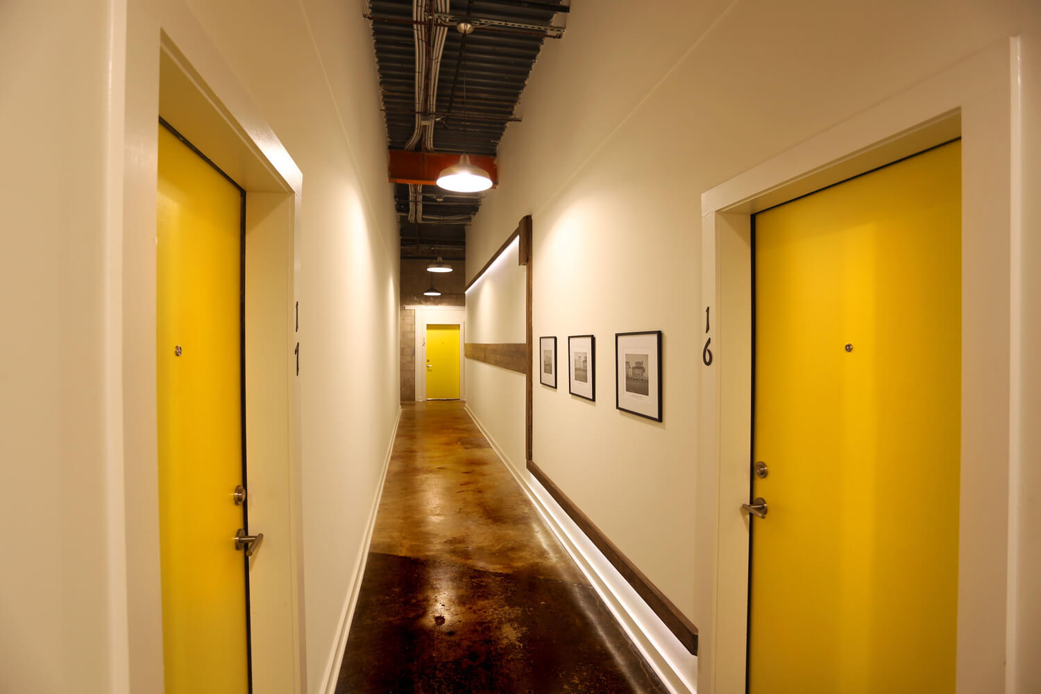 District 36 Lofts Designed by Foshee Architecture - View of Interior Hallway for Apartments