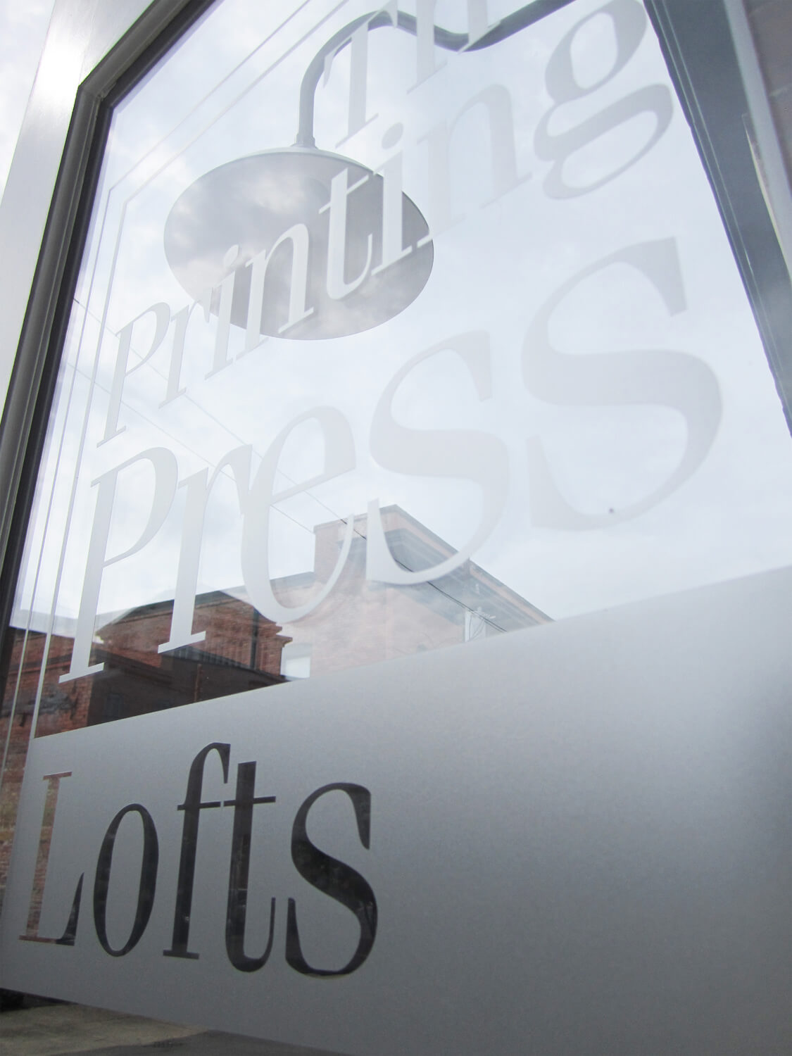 Printing Press Lofts Designed by Foshee Architecture - Sign on Front Door