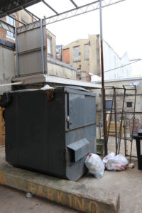 Terrible Dumpster Example - Foshee Multifamily Architecture Insights - DO NOT DO THIS!