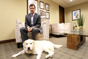 Foshee Multifamily Architecture - Homepage John Foshee Founder with Molly Dog